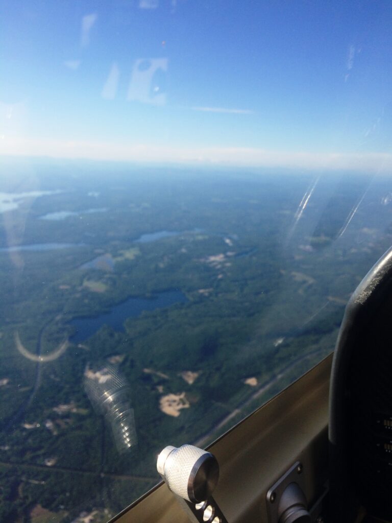 Super Seawind view of Central Maine from 7500 feet.View of the NW and the NH Presidential range under the white clouds. 